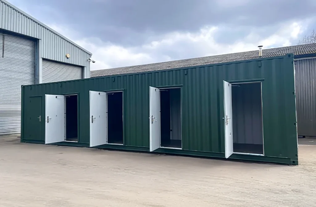 A container adapted to provide five separate storage units, helping operators offer smaller rental spaces.